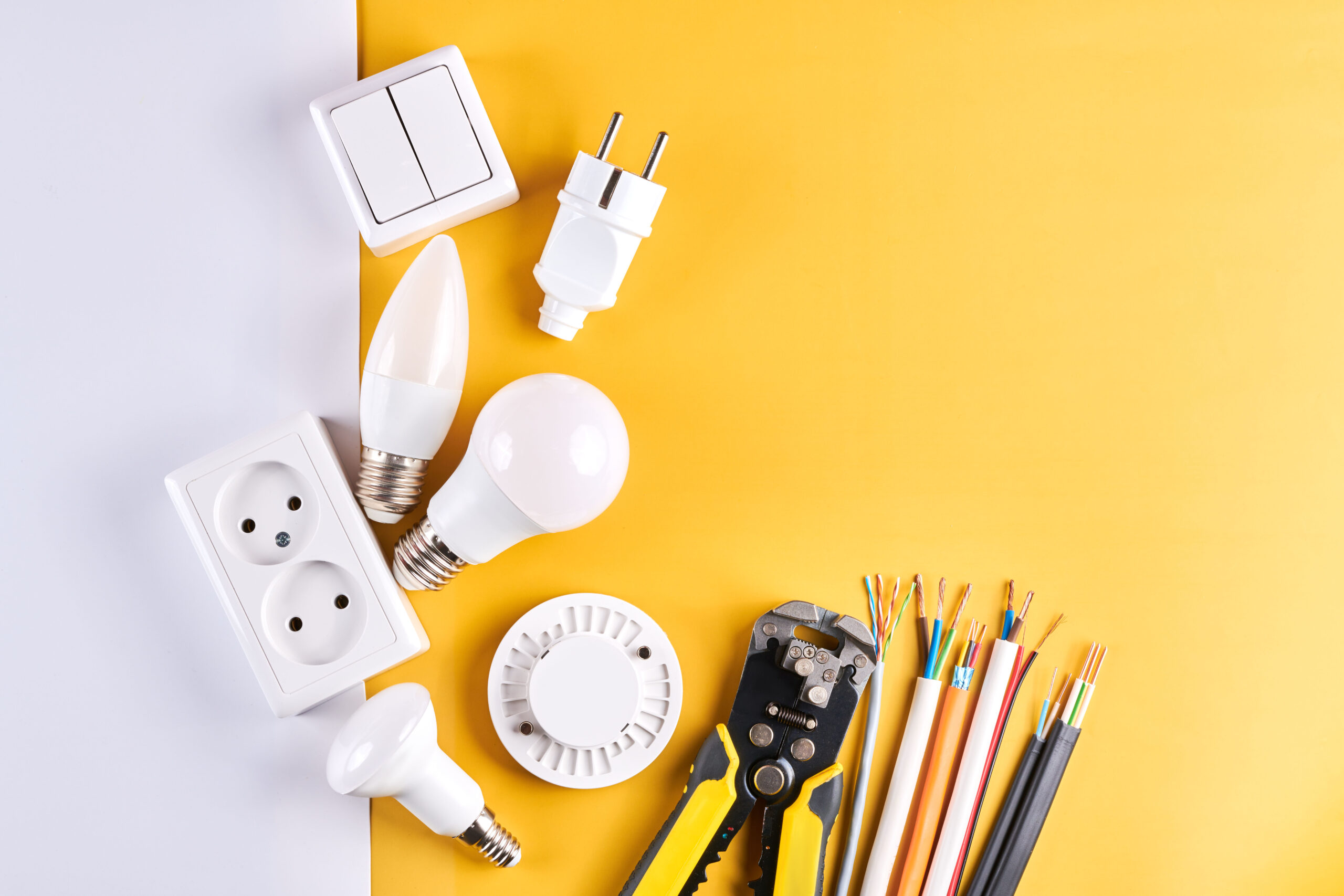 Electric tools set with dimmer switch isolated on yellow white background with copy space, controllable lighting